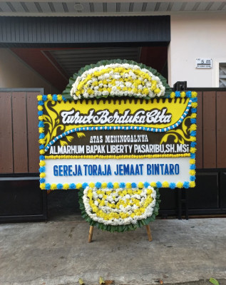 Papan Bunga Duka di Wenang